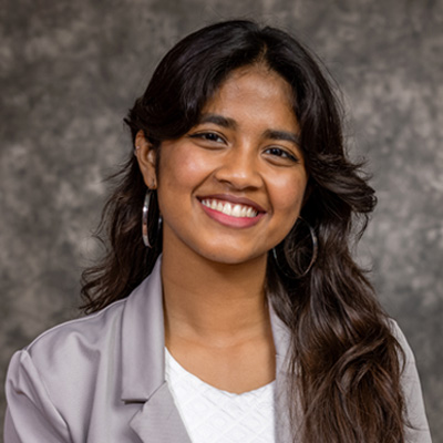 Headshot of Dipti Dev